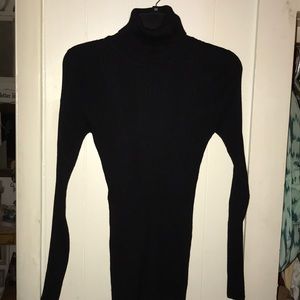 Woman’s size M black form fitting top.
